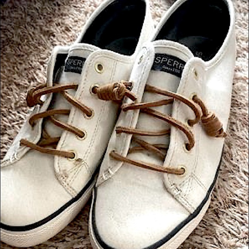 These have only been worn one time. They’re white with navy blue trim. Size 8.5